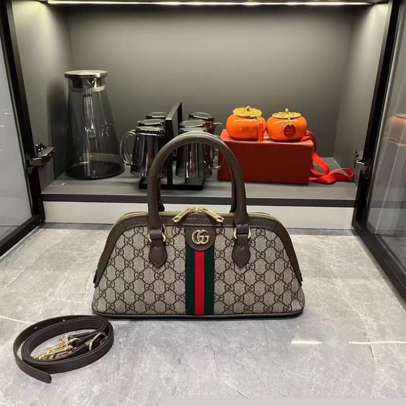 G*u*i top handle bags